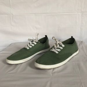 Army green keds/sneakers.